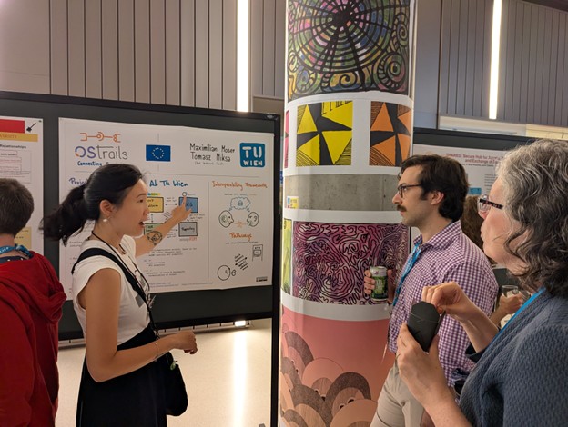 Visitors engage with the poster as Suvini Lai TUWIEN offers project specific insights photo by Maximilian Moser